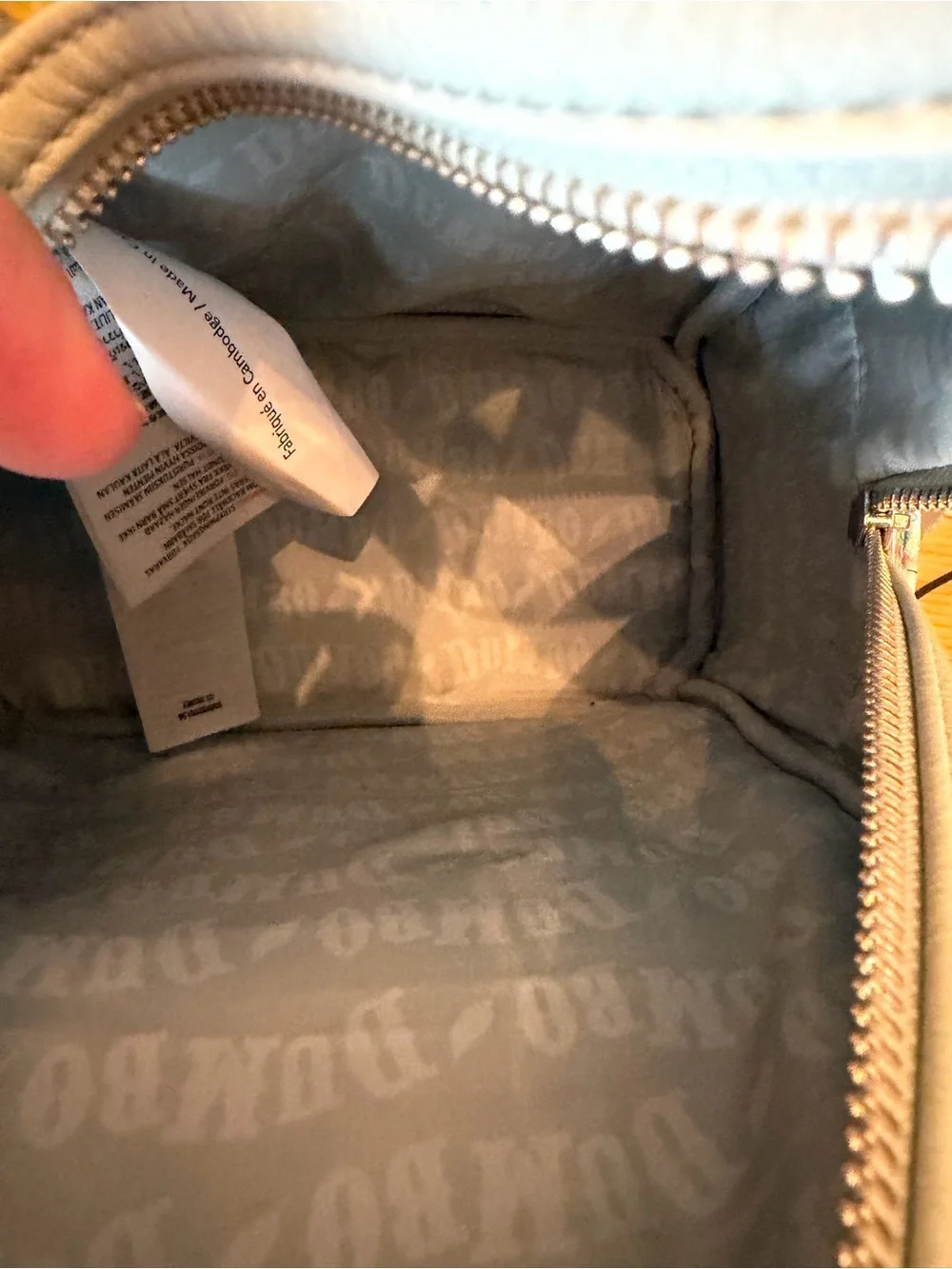 Loungefly Cream Mini Backpack with Multicolor Dumbo Print